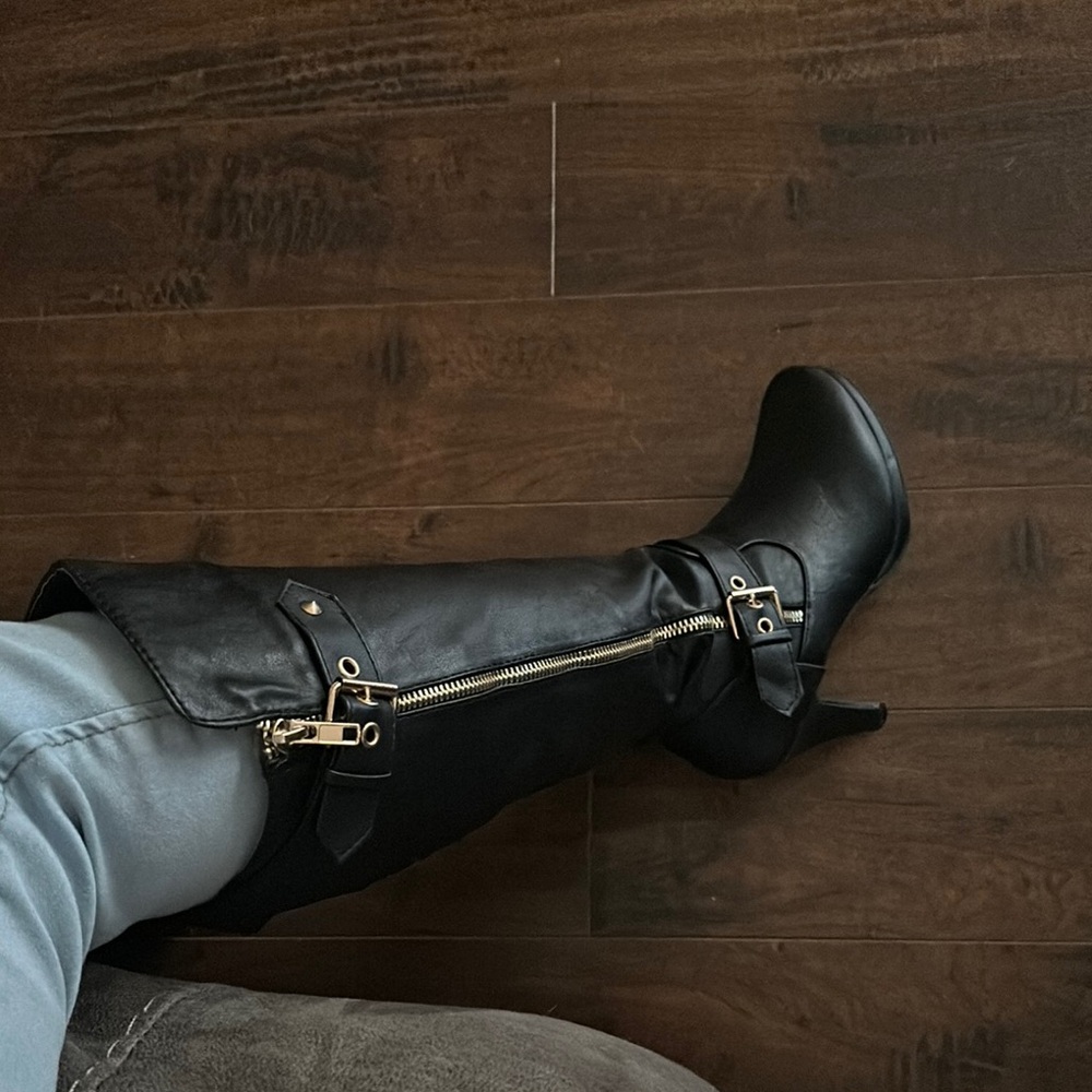 Chic Black Boots with Gold Accents